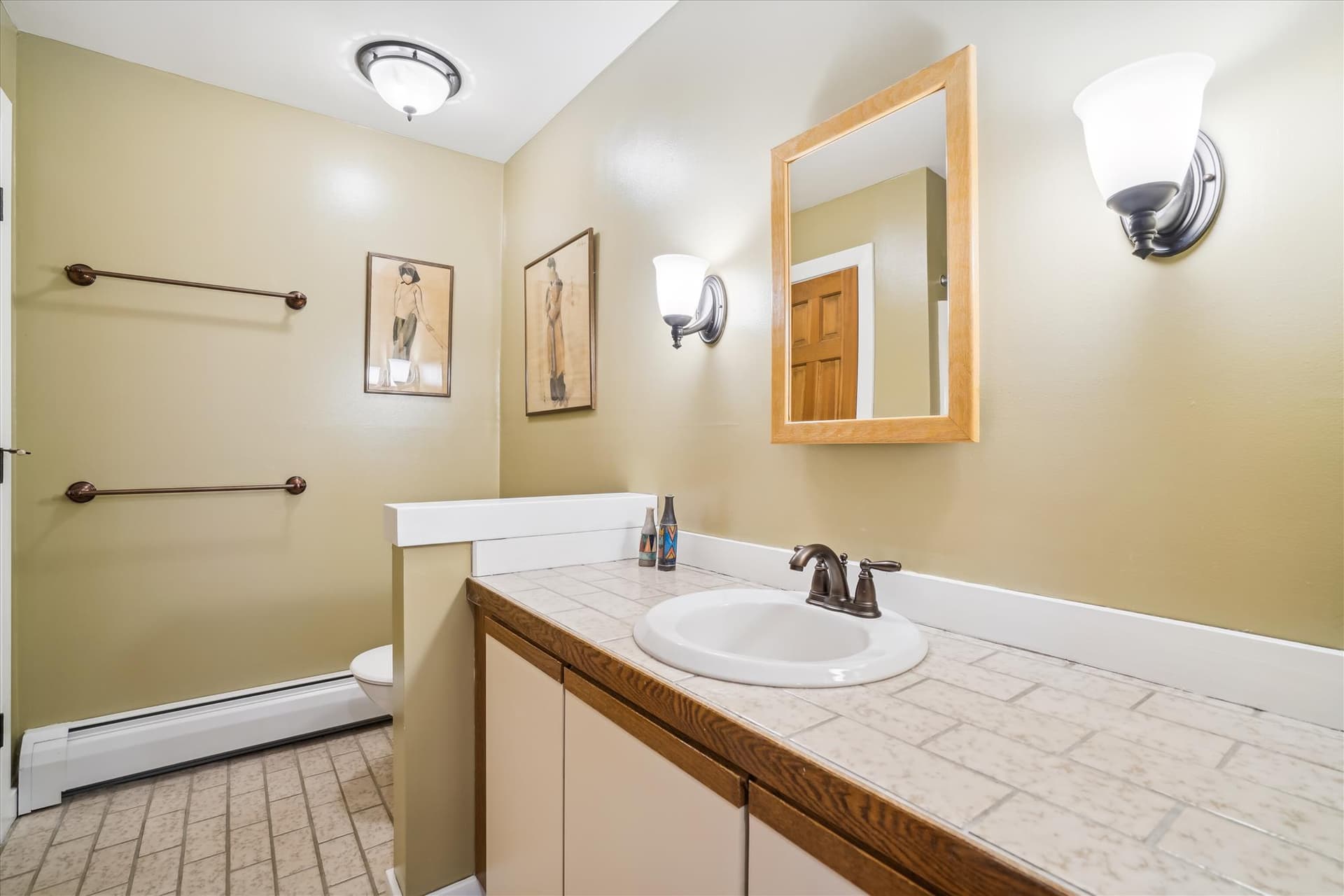 This bathroom is brightly lit.